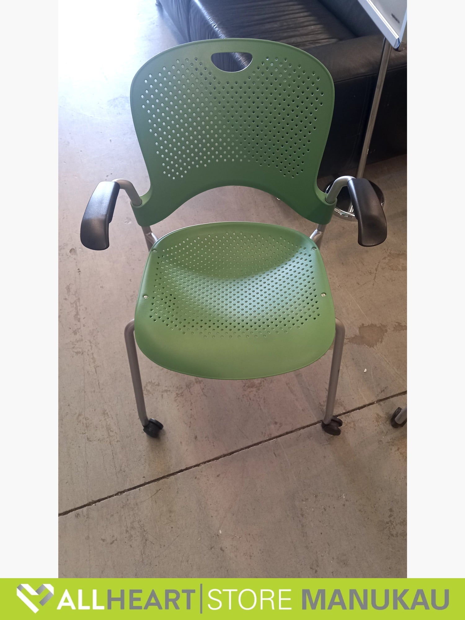 Herman Miller - Stack Chair With Arms On Wheels Green stacking chairs