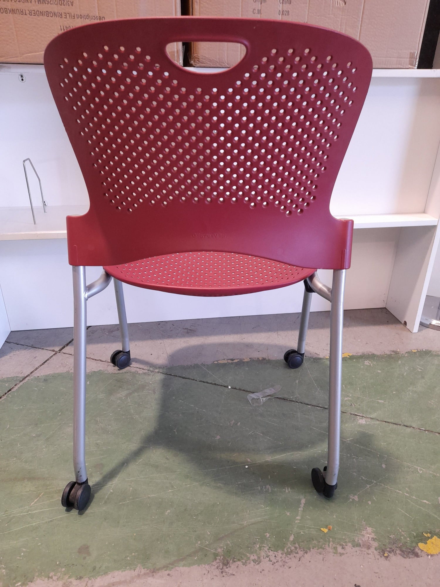 Herman Miller - Stack Chair On Wheels Dark Red