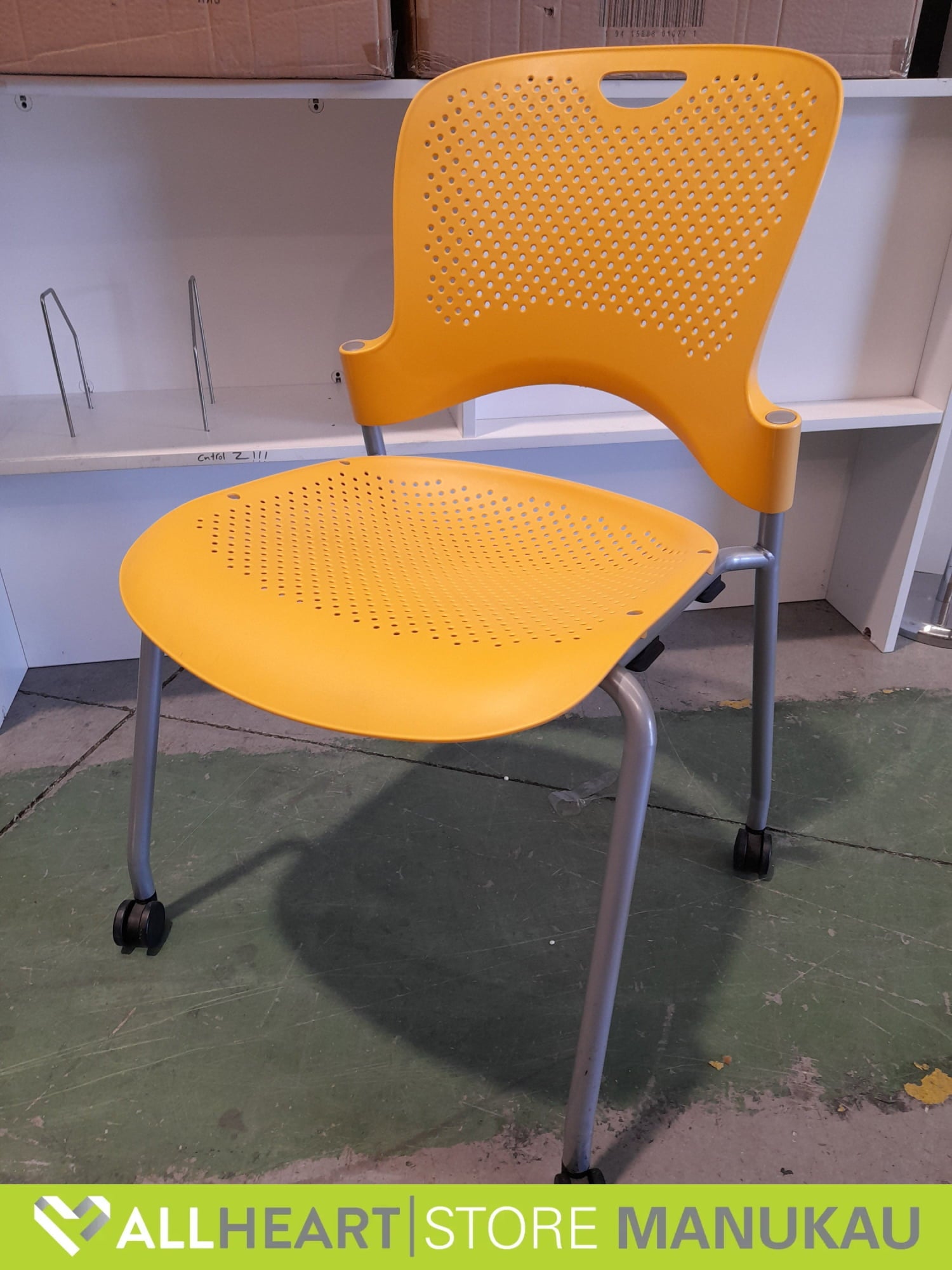 Herman Miller - Stack Chair On Wheels Yellow